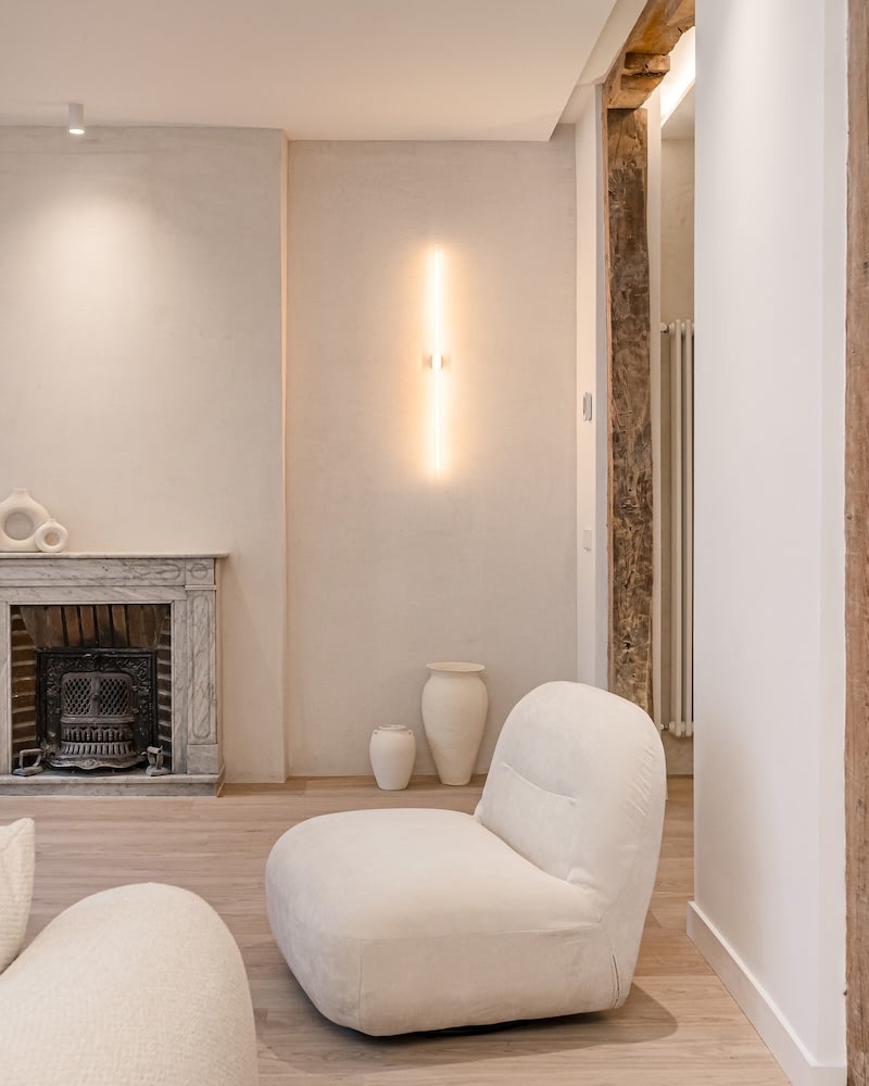 Cozy room with sofa and fireplace